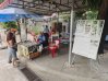 Meeting a Tuol Sleng survivor at his table while learning about his story at the museum.