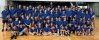 Blake, Jake, Landon and their teammates pose together with coaches at summer basketball camp