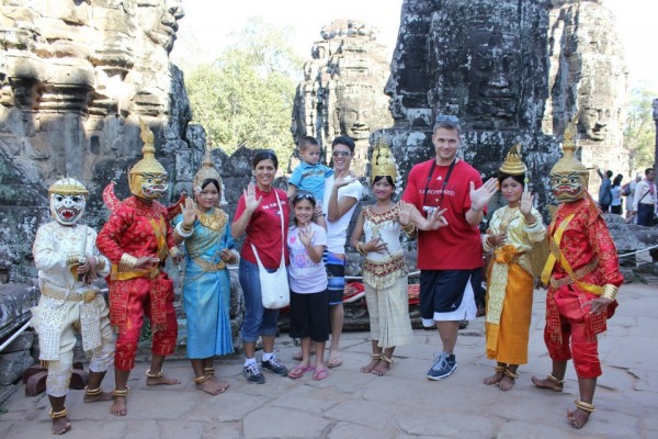 Family photo at the Banyon Temple with locals 