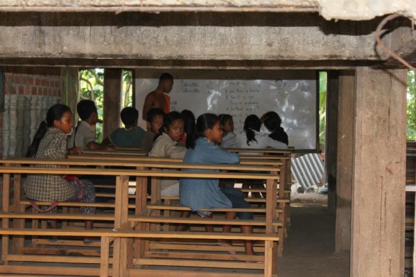 Cambodian schools are held in 2 sessions.  A morning and afternoon session with each session lasting 4 hours.  This school was taught by monks