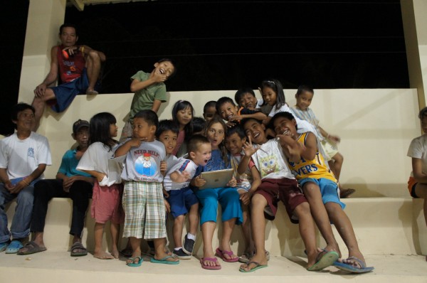 While the village volleyball game was going on, our kids were introducing the village kids to an iPad.  Not sure if more people were watching the volleyball game or the kids with the iPad