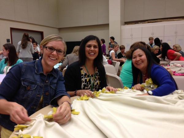 Tying fleece blankets for the Crossroads Foundation and making new friends.