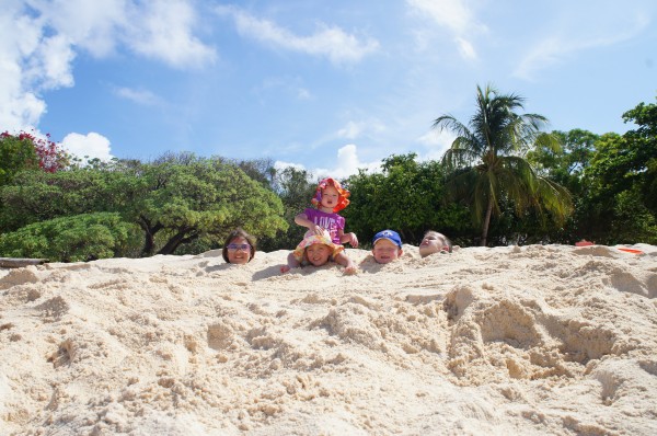 Powdery white sandy beaches at Club Paradise was perfect to bury the kids.
