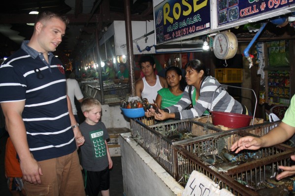 We took them to a Damp Seafood place.  You buy the food that want cooked and take it to a nearby restaurant for them to cook how you want it