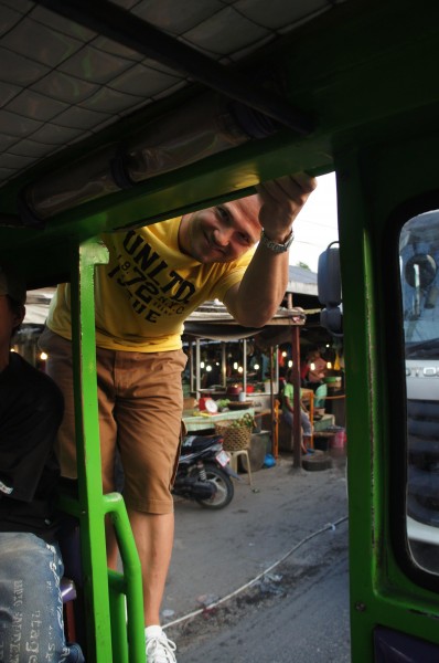 Matt has a bad back and bad knees.  So he opted to stretch out by standing on the back of the jeepney for most of the evening.