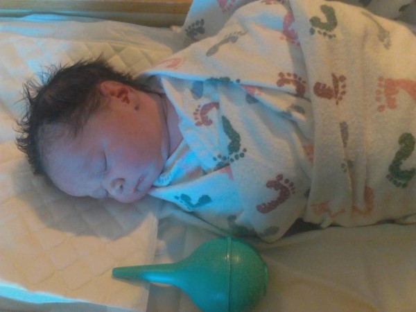 Kina Ariel was born via C-section on September 23.  She weighed in at 7lbs 9oz and 19 3/4" long.