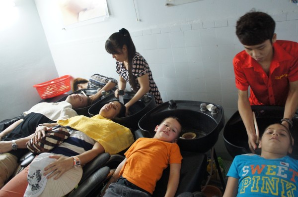 End our second day in Vietnam by getting our hair washed at a salon.  My lady felt like she was clawing my head and then she stuck her fingers in my ears a few different times...I could have done without this experience, but at least they straightened my hair for me.