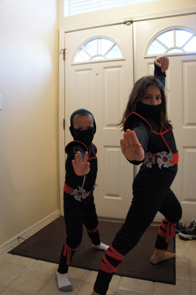 Ninjas are invading the house.  Both kids wanted to have the same ninja costume this year.