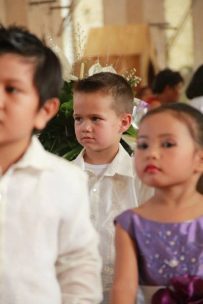 Our handsome escort was bribed to behave for the 2 hours we were at the church