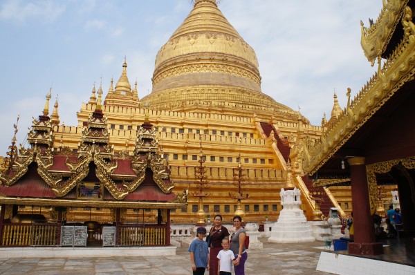 With our tour guide at the Shwezigone Pagoda, which was one of many that we saw in Bagan.