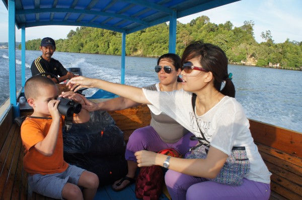 Esjay, our tour guide, was well prepared and brought along binoculars that Mason loved using