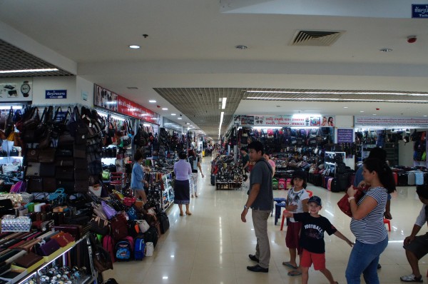 Inside an indoor market/swap meet type place.  Almost every country in Asia has something like this