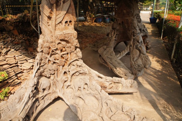 Cool carvings out of tree trunks at Ho Pra Keo