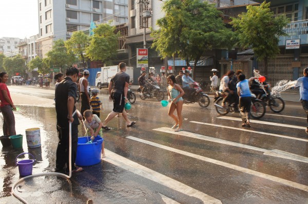 Matt and the kids joined in the fun of throwing water on people as they drove by