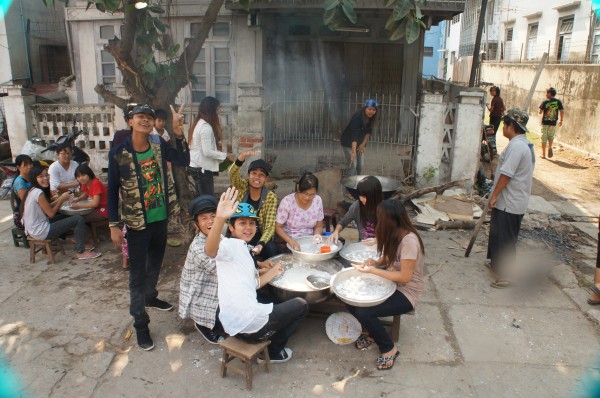 The locals here are making a traditional sugar snack that is only eaten during the Water Festival