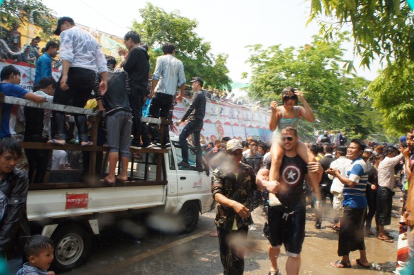 Matt and Kalani got out of the van and started dancing with all of the locals while getting water thrown on them