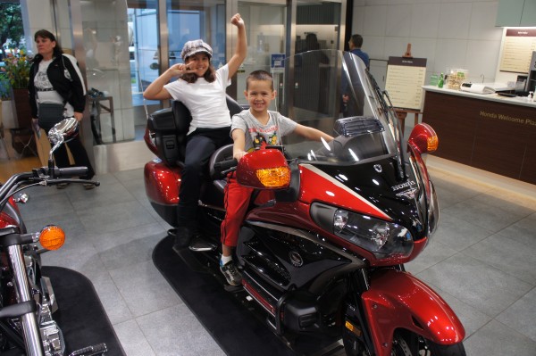 Mason really liked the motorcycles at the Honda showroom and wants this one.