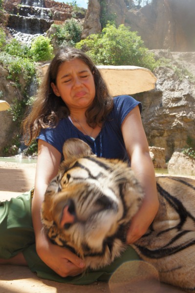 Kalani got disgusted with how sweaty and "stinky" this tiger was while she held the head.