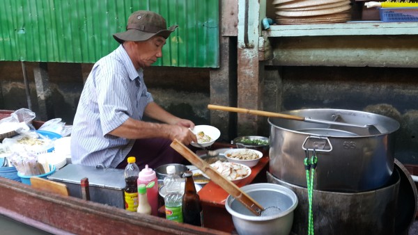 We bought some yummy soup from this man right from his boat. You leave your bowl and spoon in your boat when you are finished and some how they make their way back to the vendors.