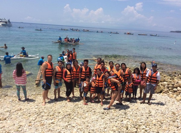 We are already to make memories together by snorkeling the whale sharks.