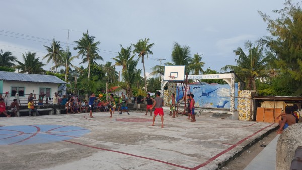 Even on a small island in the Philippines, basketball games are still played.