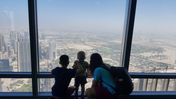 Our kids looking out at Dubai from the Burj Kalifa