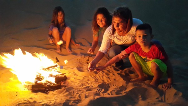 We built a fire in the sand and made s'mores.
