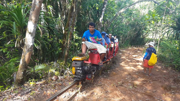 We saw people riding a monorail that didn't go very fast, but they didn't have to walk uphill either.