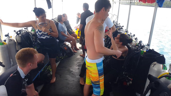 After getting only six hours of sleep, we were on the dive boat with about a dozen other divers. A dive boat is full of dive tanks and gear. The people were really nice, friendly and helpful as well.