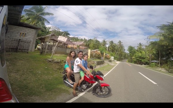 Our kids love to ride on the motorcycle with their cousin Sherwin.