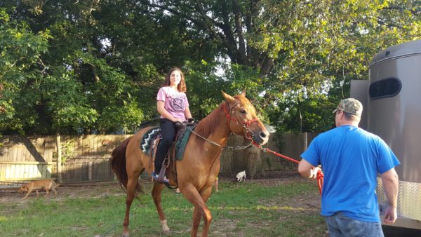 Kalani was the first one on a horse and she got the tallest horse.